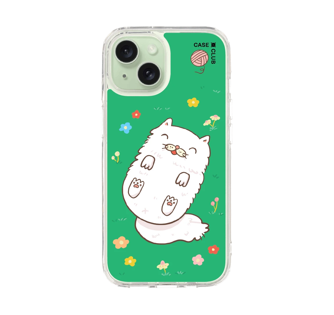 แมวเปอร์เซียในสวนดอกไม้สีเขียว